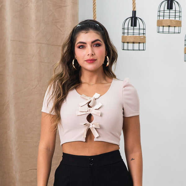 Blusa manga corta moños