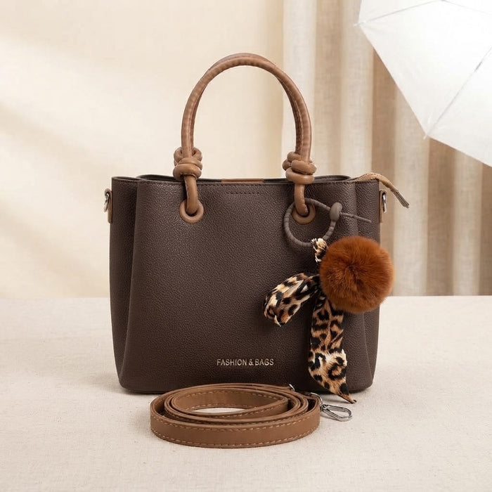 Bolso de dama con asas y correa