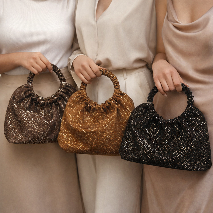 Bolso de mano con apliques brillantes